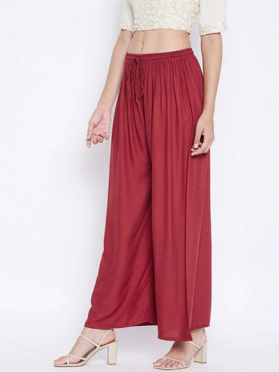 Rust solid rayon palazzo, lightweight and comfortable, perfect for a refreshing look.