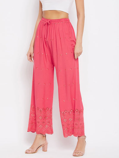 Peach solid rayon Chikankari palazzo pants.