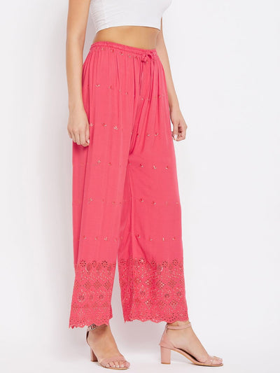 Peach solid rayon Chikankari palazzo from Clora for a refreshing look.
