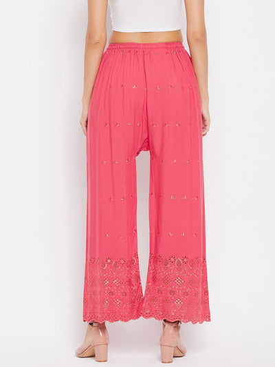 Peach solid rayon palazzo with chikankari design from Clora.