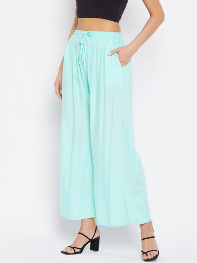 Sky Blue Solid Rayon Sharara worn by model with black top and heels.