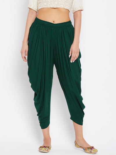 Bottle Green Rayon Dhoti Salwar with elasticated waistband and solid pattern.