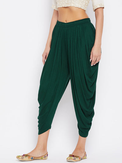 Bottle Green Rayon Dhoti Salwar with elastic waistband and solid pattern.