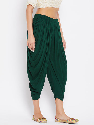 Bottle Green Rayon Dhoti Salwar with elasticated waistband and solid pattern.