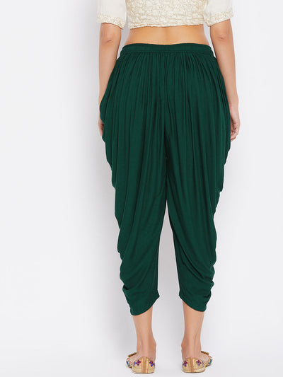 Bottle Green Rayon Dhoti Salwar with elasticated waistband and solid pattern.