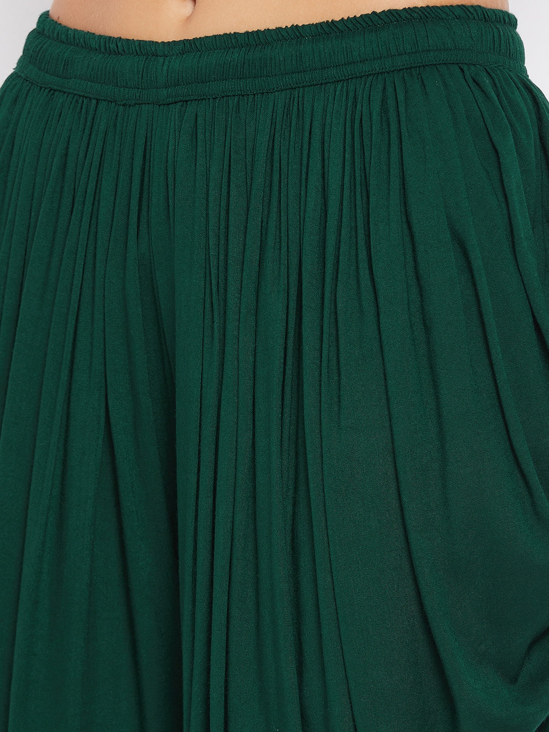 Bottle Green Rayon Dhoti Salwar with elasticated waistband and solid pattern.