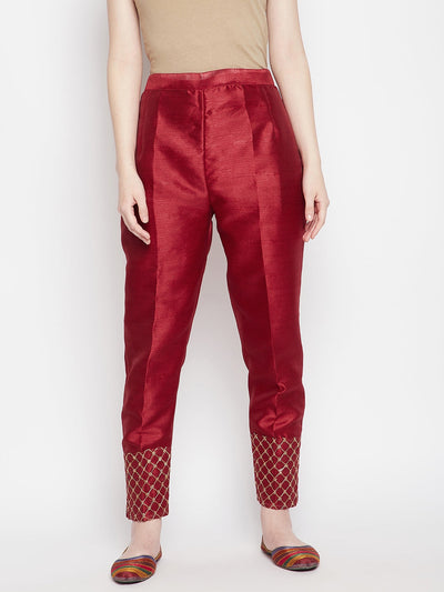 Maroon hem design silk trousers with embellished detailing, offering a perfect slim fit.