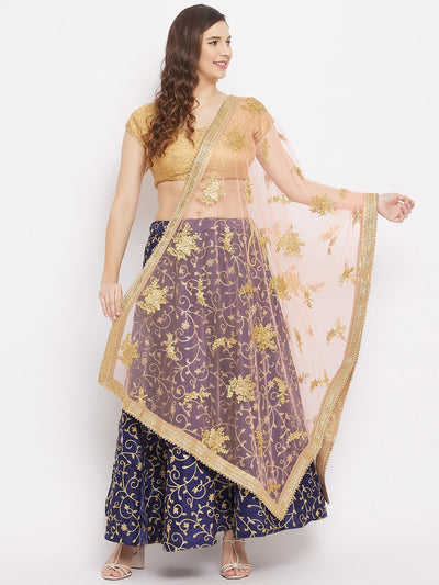 Peach embroidered net dupatta with floral design, styled with traditional outfit.