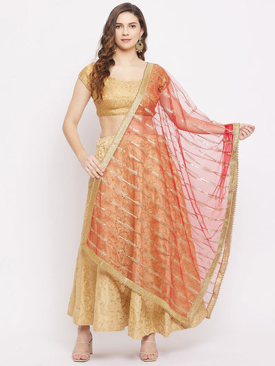 Red sequined net dupatta paired with a gold kurta set.