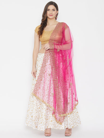 Magenta embroidered net dupatta with sequins styled with traditional attire.