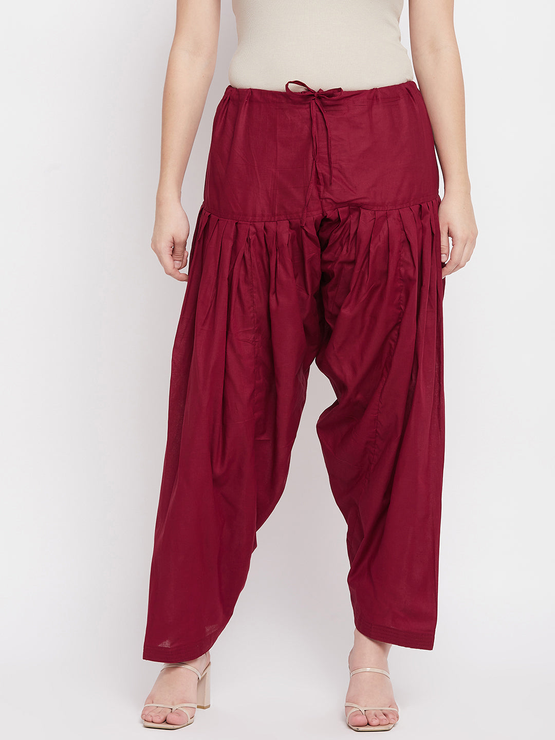 Maroon solid pure cotton salwar by Clora.