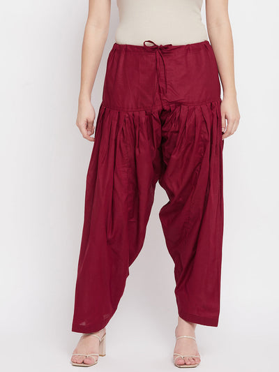 Maroon solid pure cotton salwar by Clora.
