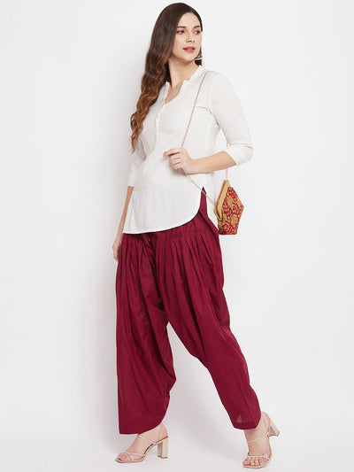 Maroon solid pure cotton salwar with white kurta, comfortable and lightweight.