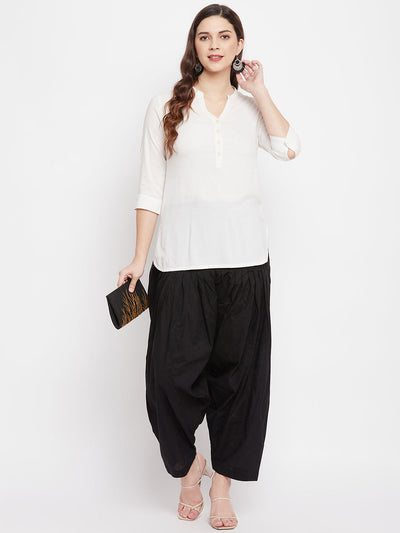 Black solid pure cotton salwar paired with a white kurta.