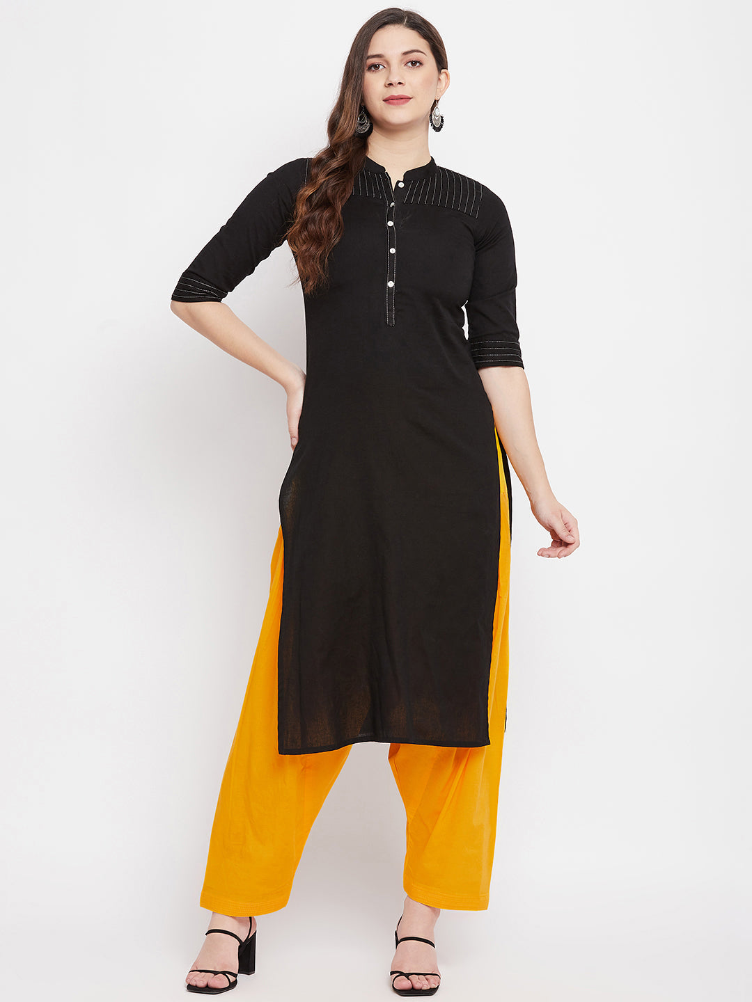 Yellow solid pure cotton salwar with black kurta, lightweight and comfortable.