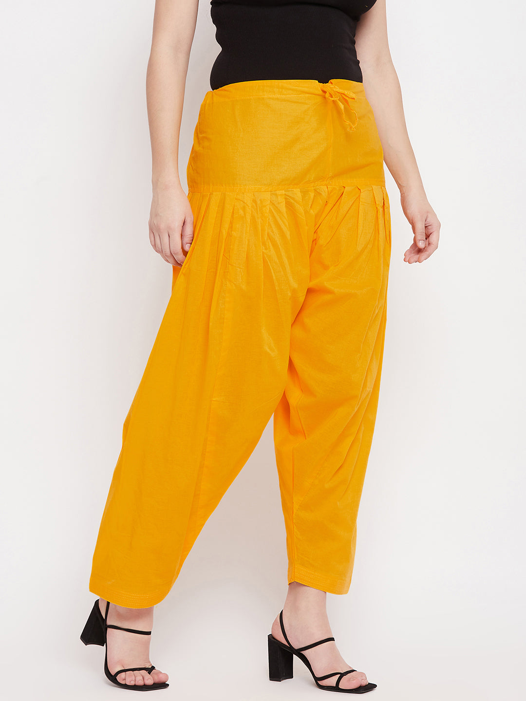 Yellow solid pure cotton salwar, lightweight and comfortable for all-day wear.