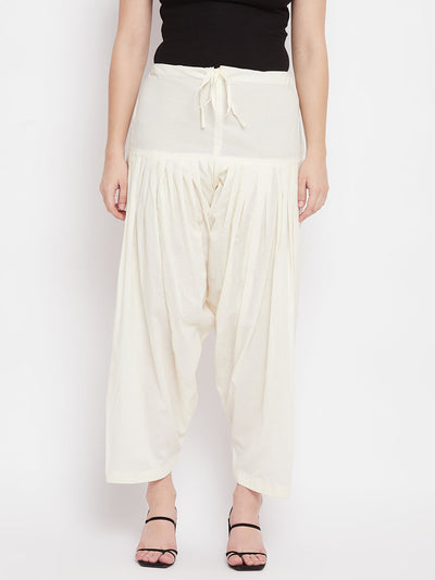 Cream solid pure cotton salwar, lightweight and comfortable for daily wear.