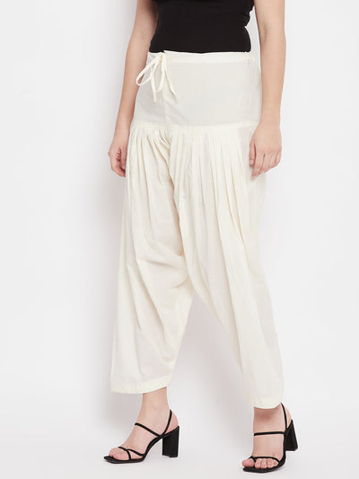 Cream solid pure cotton salwar, lightweight and comfortable for all-day wear.