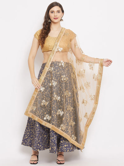 Golden embroidered net dupatta with sequins, styled with ethnic attire.