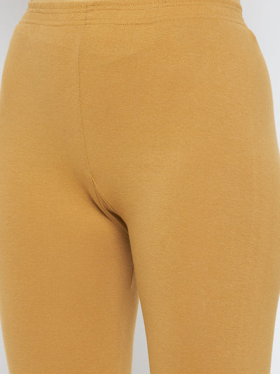 Fawn solid ankle length leggings made from cotton lycra fabric.