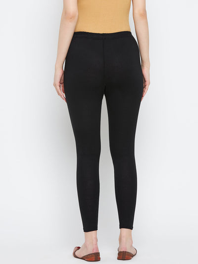 Black solid ankle length leggings made from cotton lycra fabric, perfect for a casual wardrobe update.