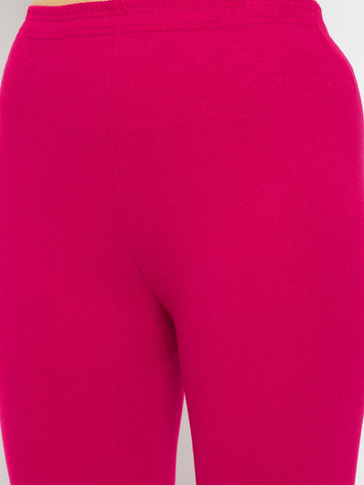 Magenta solid ankle length leggings made from cotton lycra fabric.