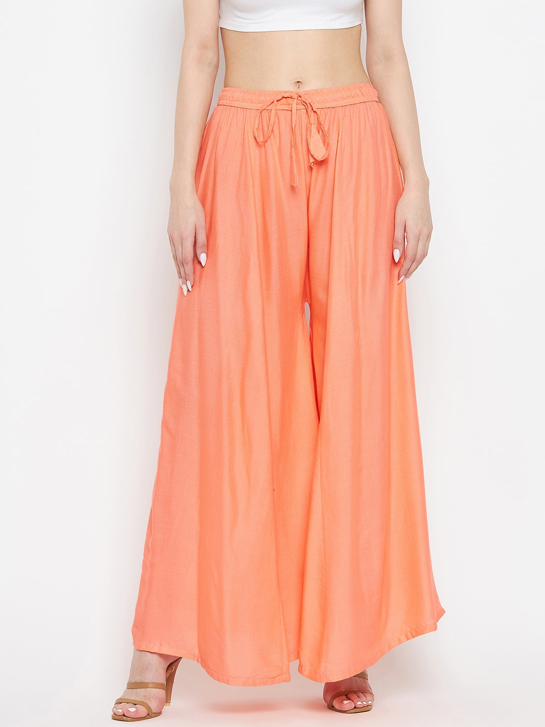 Peach solid rayon sharara for women, comfortable summer wear.