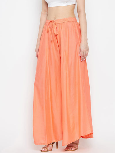 Peach solid rayon sharara, lightweight and comfortable for summer wear.