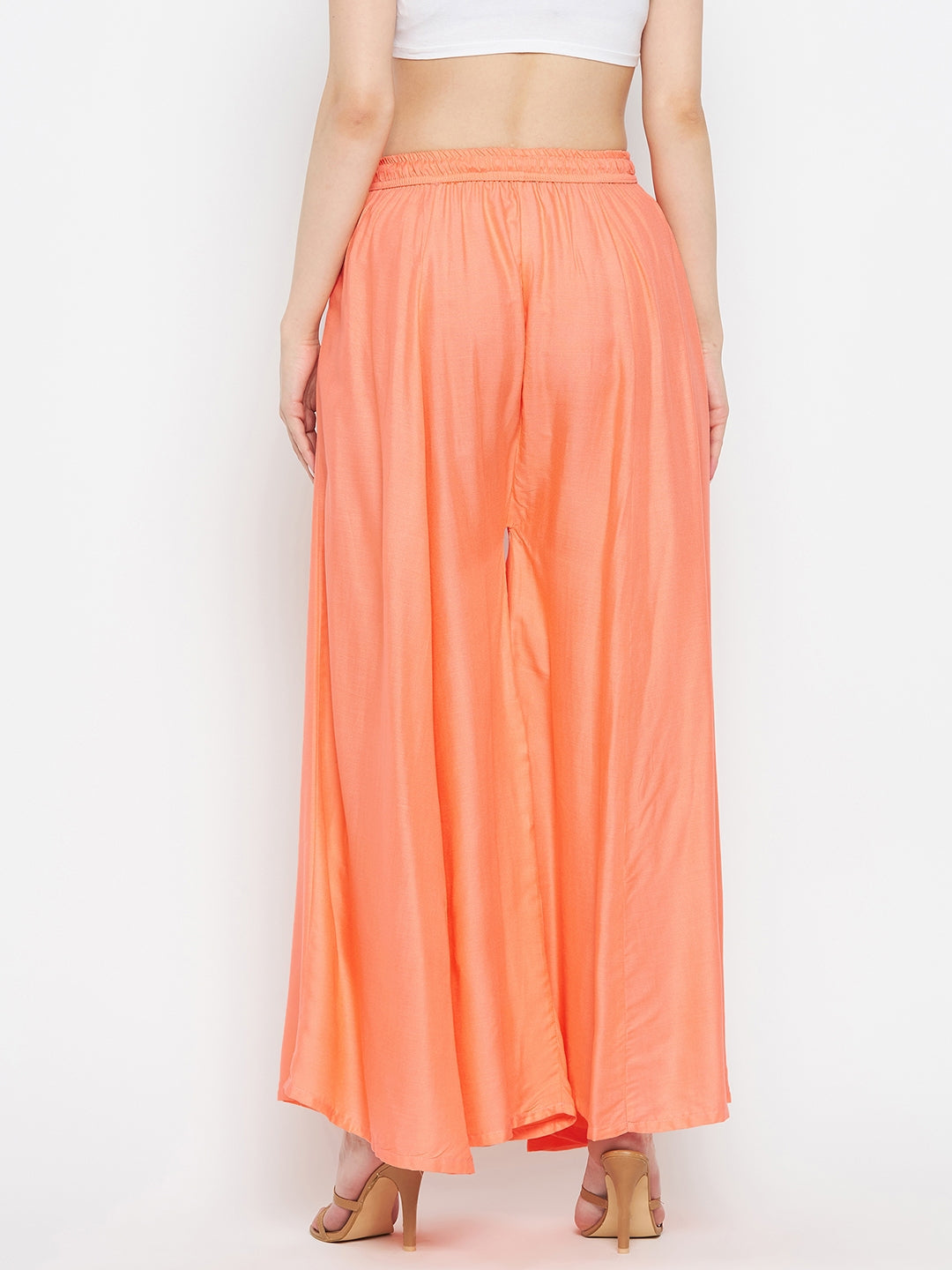 Peach solid rayon sharara, lightweight and comfortable summer wear.