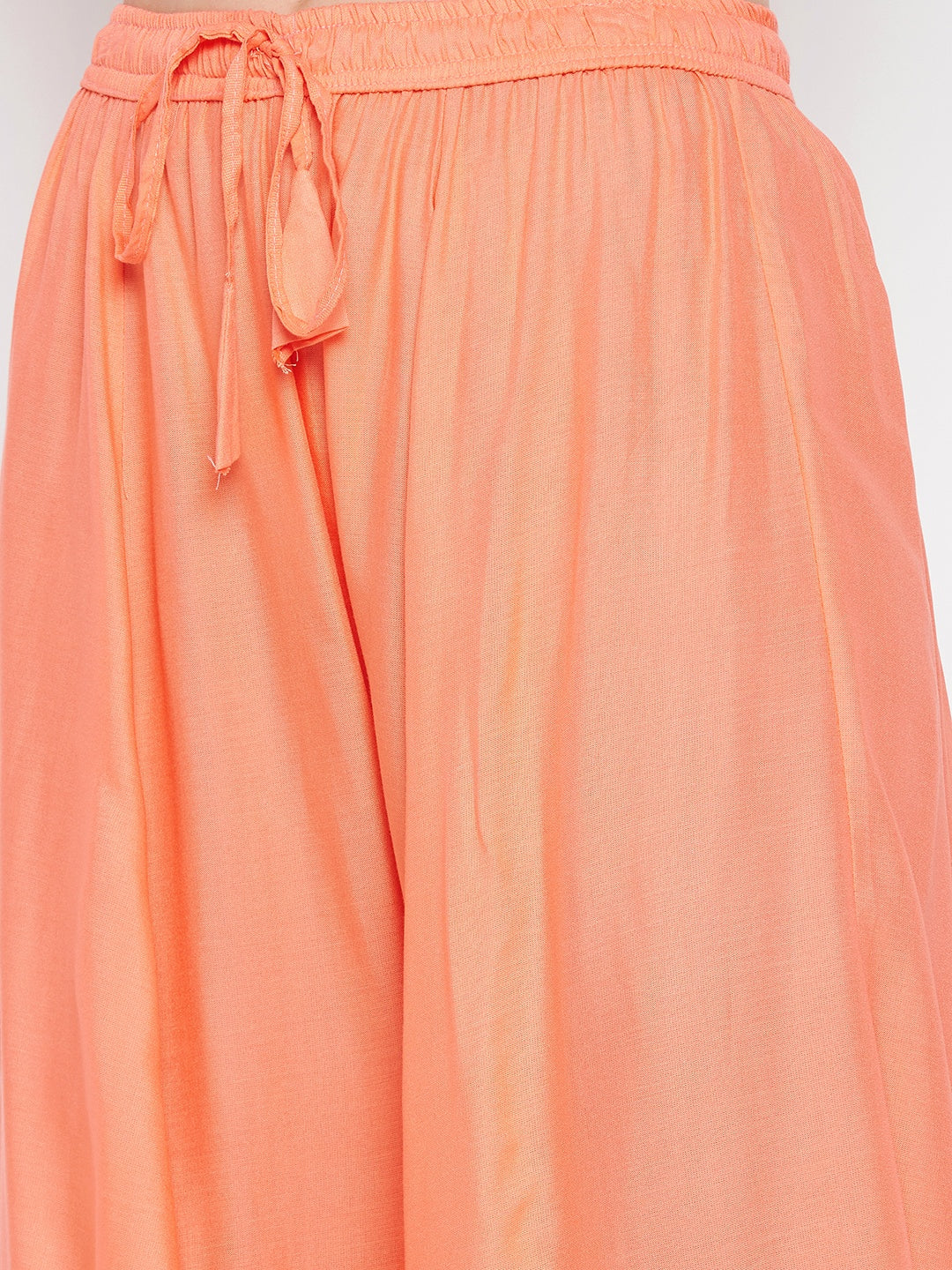 Peach solid rayon sharara with drawstring waist detail.