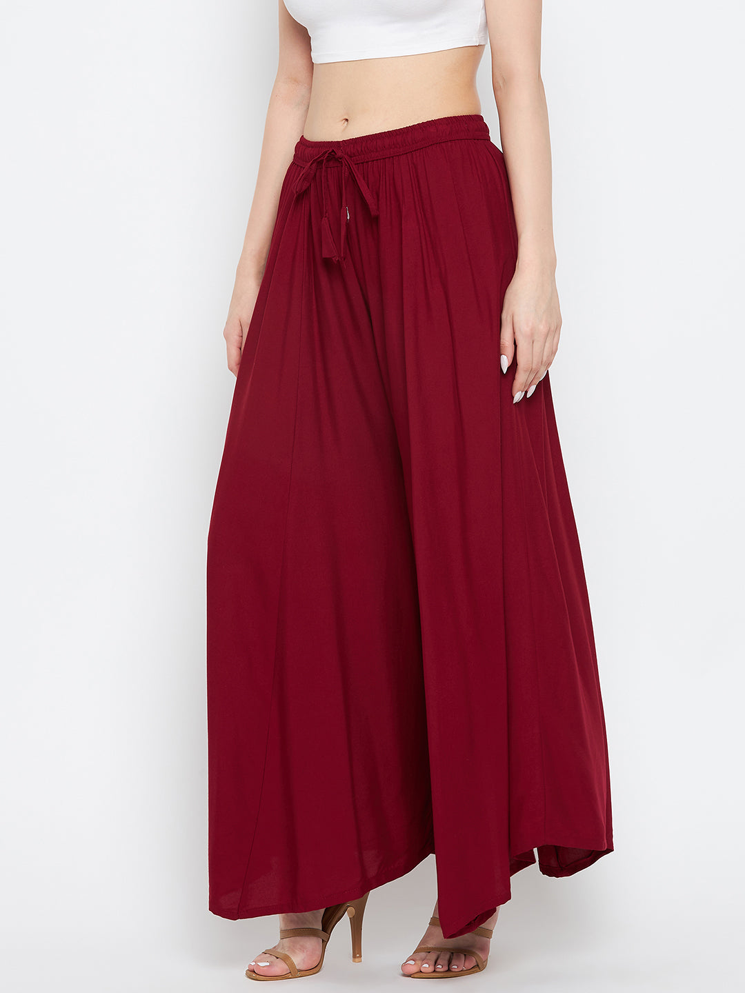 Maroon solid rayon sharara with elastic waist and tie detail.
