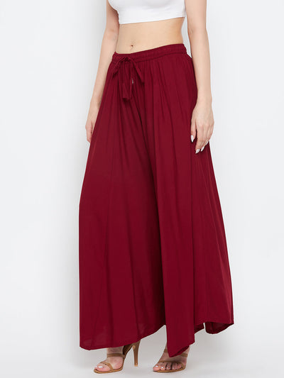 Maroon solid rayon sharara with elastic waist and tie detail.