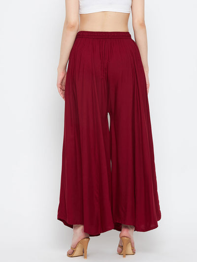 Maroon solid rayon sharara with elastic waistband.