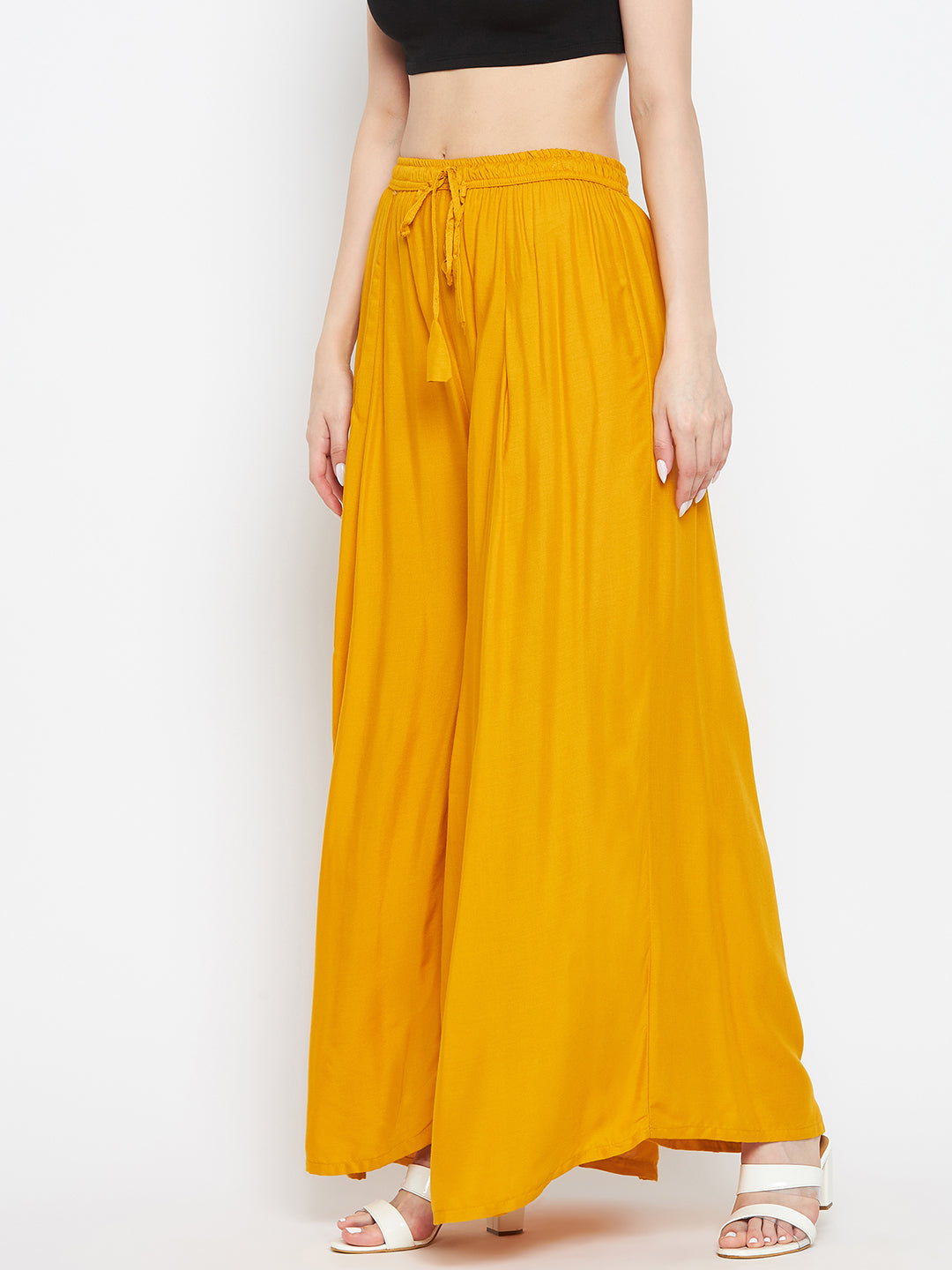 Mustard solid rayon sharara, lightweight and comfortable for casual wear.