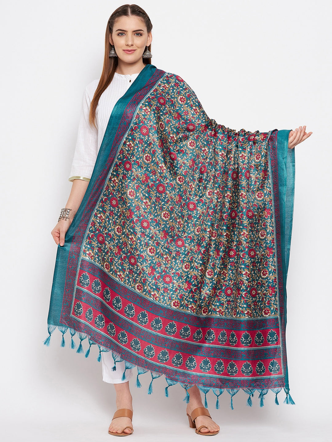 Teal printed silk dupatta with floral design and tassels.