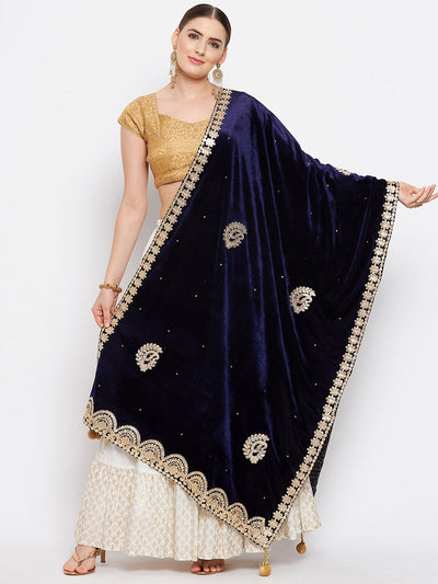 Navy blue gotta patti velvet dupatta elegantly draped over traditional outfit.
