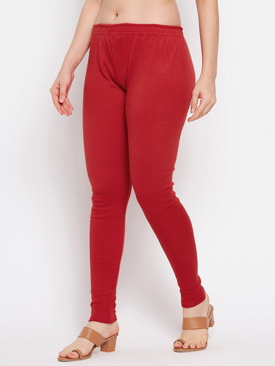 Red solid woolen leggings for women, showing a comfortable and stylish fit, ideal for pairing with kurta and high heels.