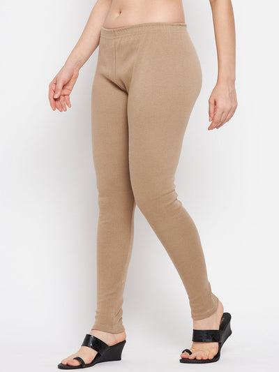Dark fawn solid woolen leggings worn by a model.