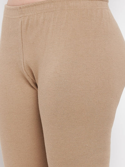 Dark fawn solid woolen leggings for women.