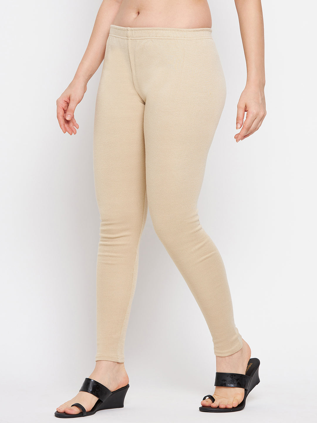 Light fawn solid woolen leggings for women, comfortable and stylish.