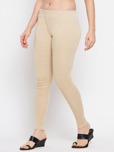 Light fawn solid woolen leggings for women, comfortable and stylish.