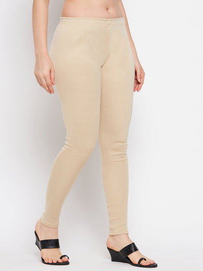 Light fawn solid woolen leggings for women, made from premium woolen fabric.