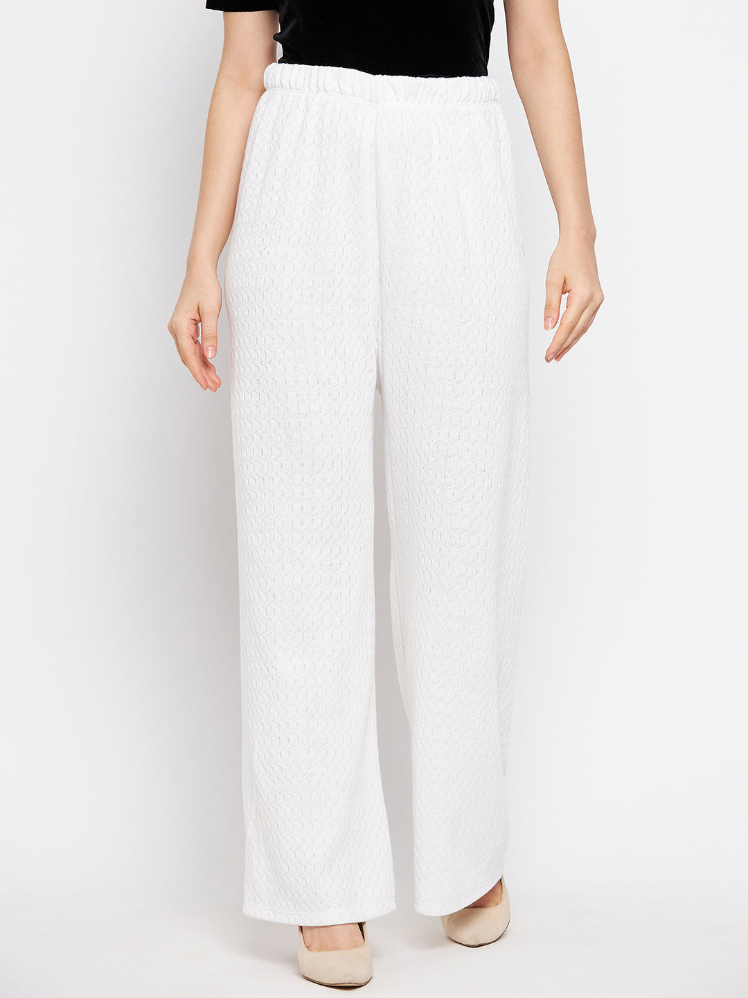 White solid woolen palazzo for women, made from premium quality fabric, ideal for casual summer wear.