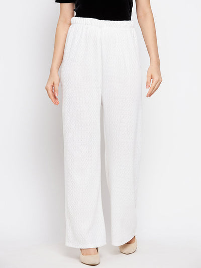 White solid woolen palazzo for women, made from premium quality fabric, ideal for casual summer wear.