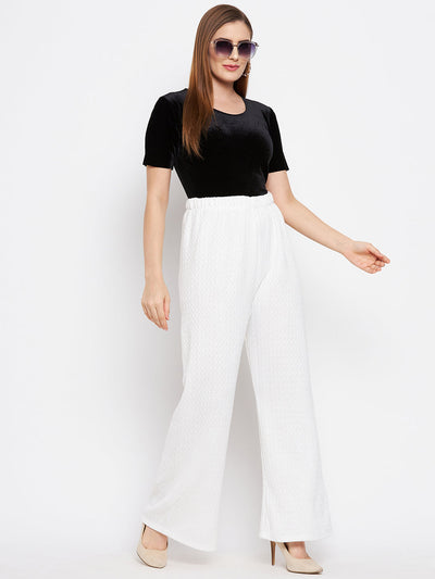 White solid woolen palazzo pants with comfortable fit.