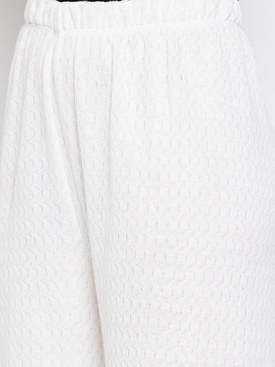 White solid woolen palazzo with textured knit pattern.