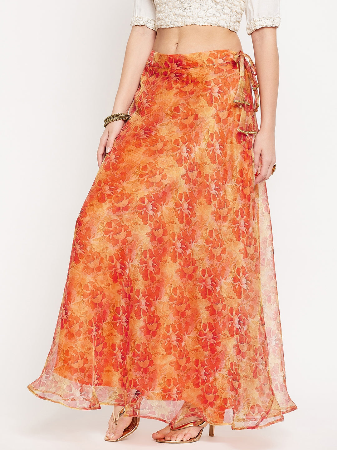 Orange floral printed organza skirt with flared hem and zipper.