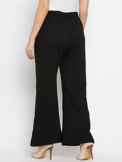 Black woolen palazzo pants for women, part of a navy and black pack, showcasing a casual summer style.