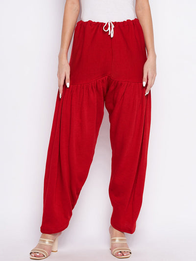 Red solid woolen salwar, lightweight and comfortable.