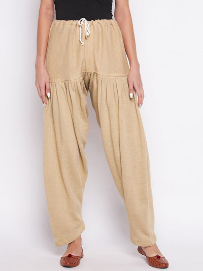 Fawn solid woolen salwar for comfort and style.